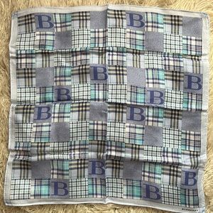 Woman’s Burberry scarf
